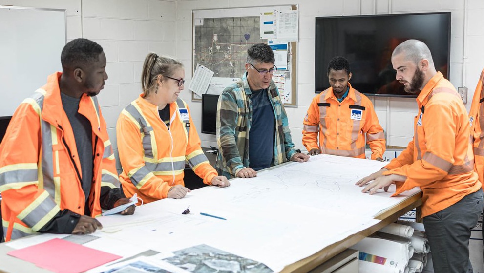 A group of workers planning