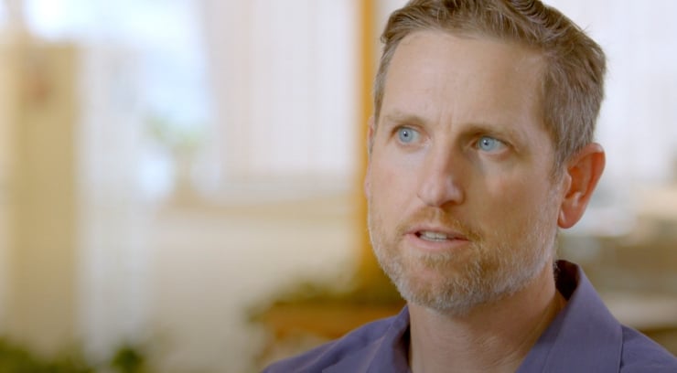 An image of a man with blue eyes.