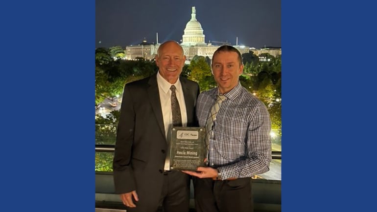 two men holding the NOISH award